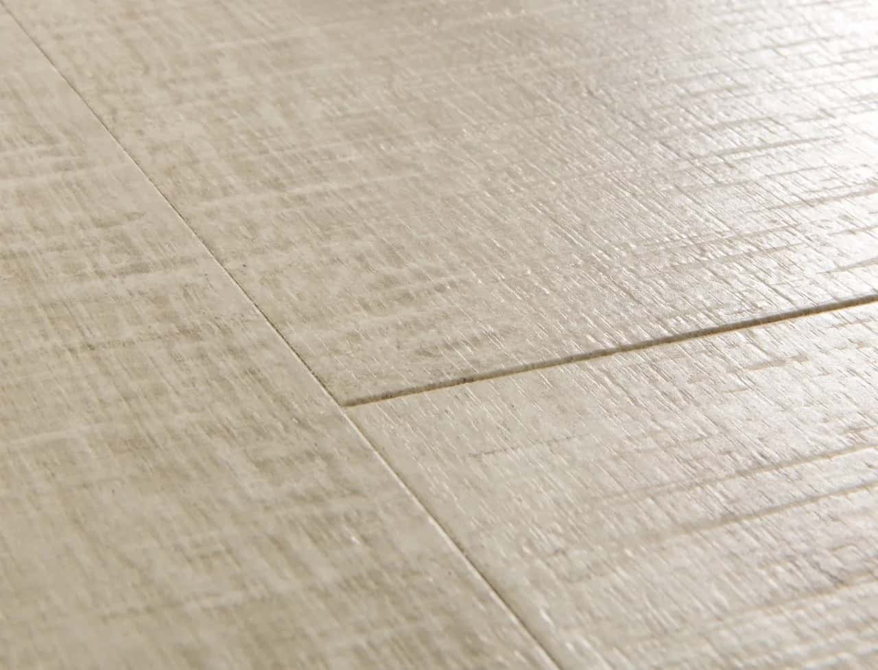 Saw cut oak beige Laminate Impressive